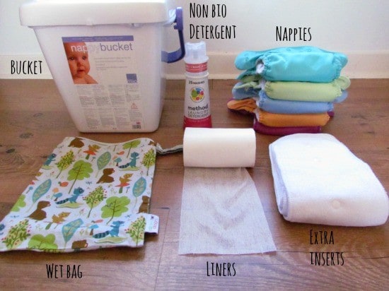 washable nappies kit featuring a nappy bucket, reusable nappies, extra inserts, liner, a wet bag and non-bio detergent.