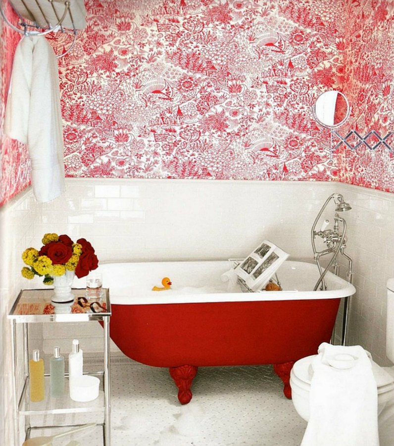 red metal clawfoot bath tub