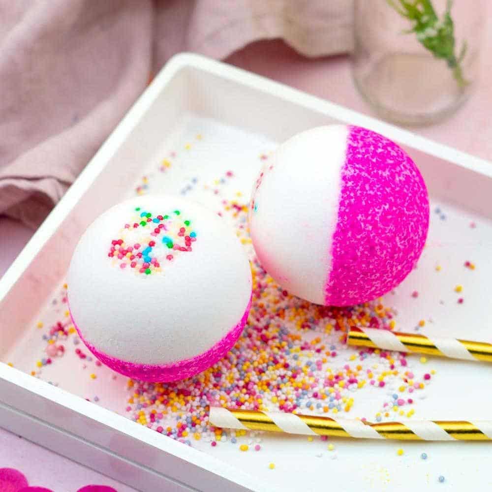 A colourful white and pink bath bomb
