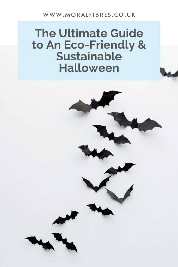 Image of black paper bats with a blue text box that says the ultimate guide to an eco-friendly and sustainable halloween