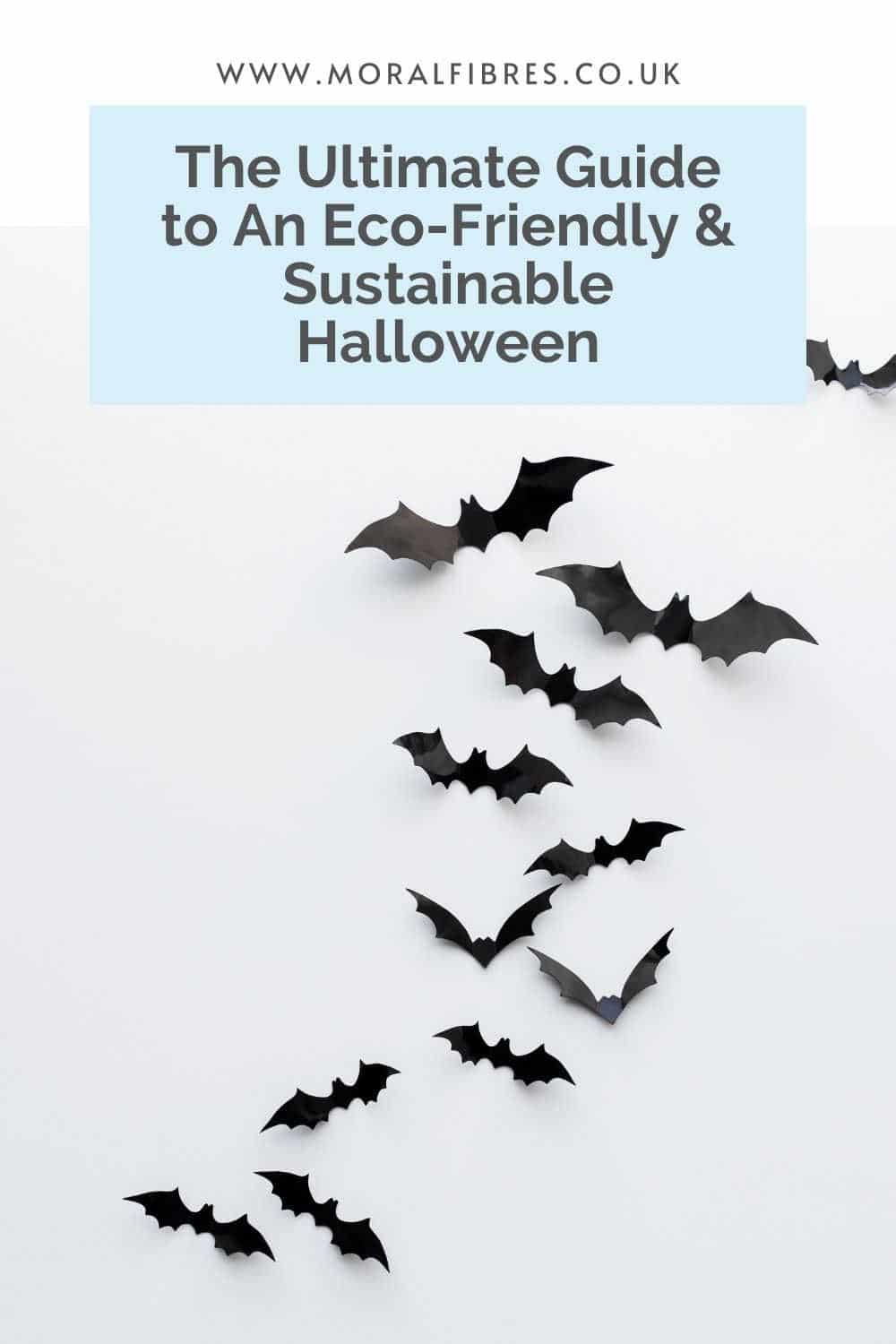 Black paper bats with a blue text box that says the ultimate guide to an eco-friendly and sustainable halloween