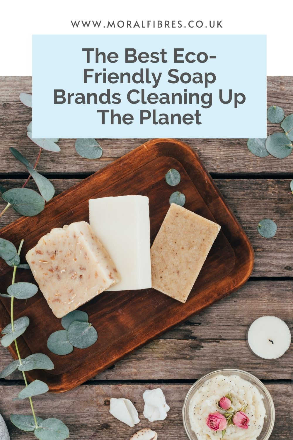 Three bars of soap on a wooden table, with a blue text box that says the best eco-friendly soap brands cleaning up the planet.