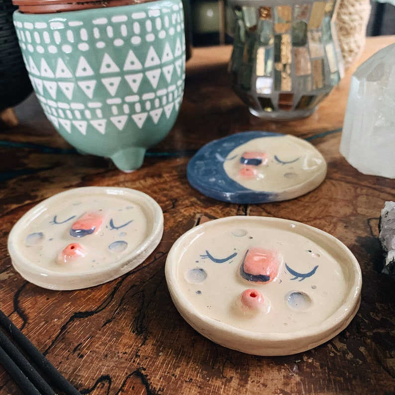 Clay moon incense holders