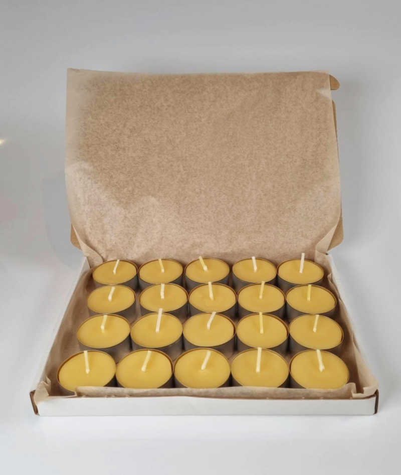 box of beeswax votive candles