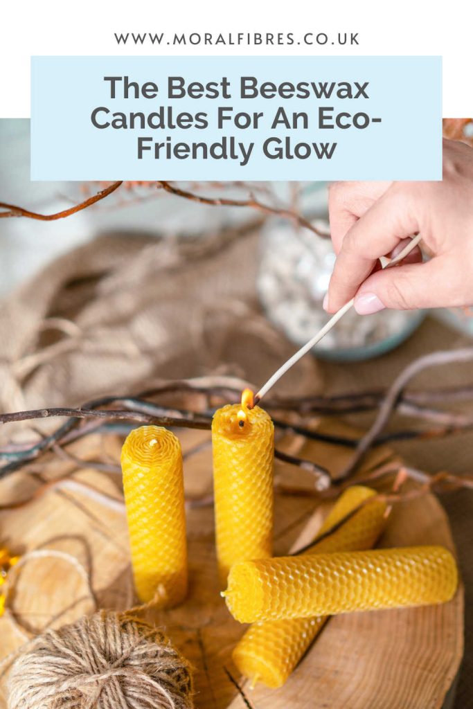Person lighting rolled beeswax candles, with a blue text box that says the best beeswax candles for an eco-friendly glow.