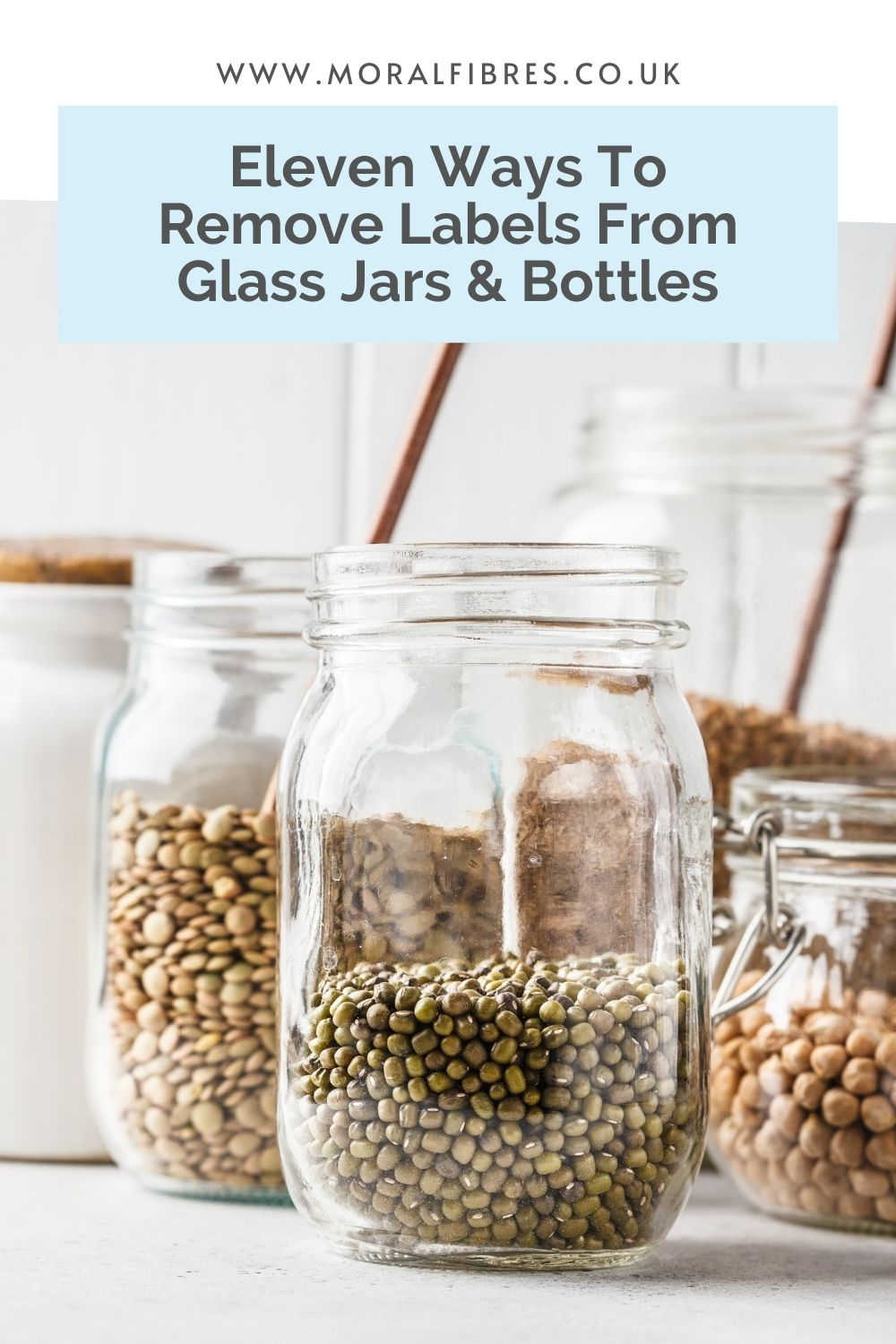 Glass pantry jars, with a blue box that says how to remove labels from glass jars and bottles eleven different ways.