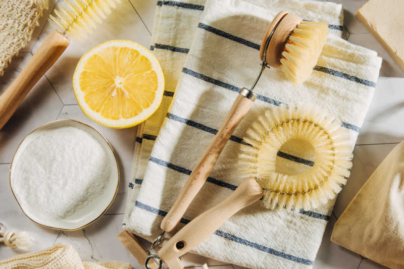 eco cleaning tools on stripe dish towel