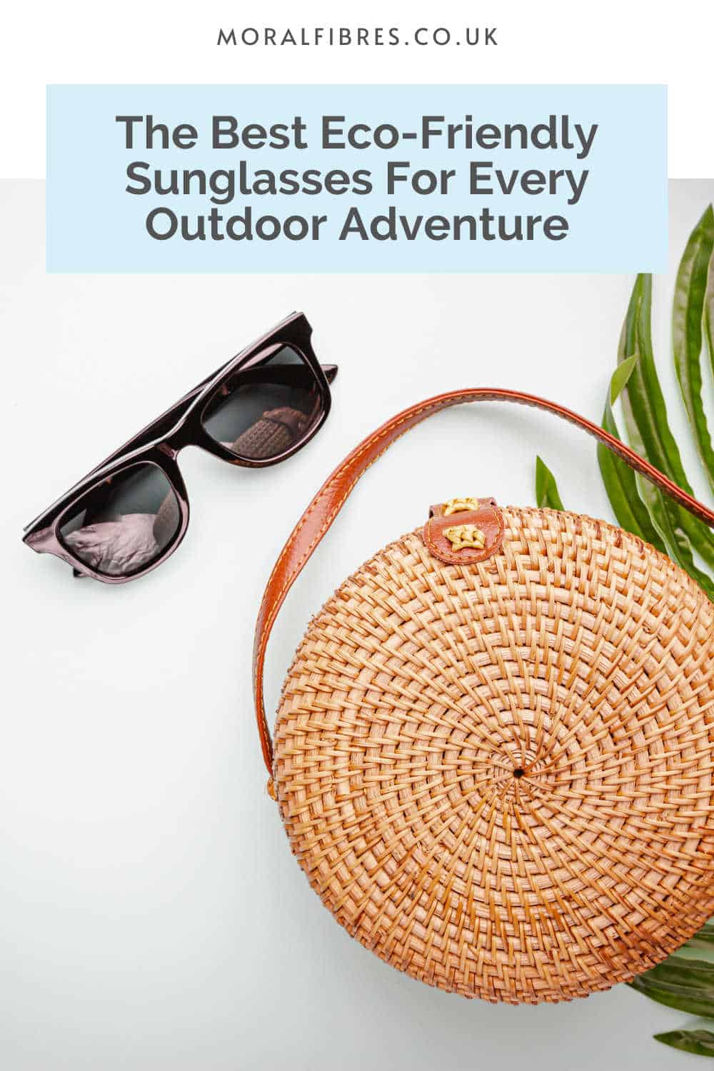 Sunglasses next to wicker bag and green leaf, with blue text box that reads the best eco-friendly sunglasses for every outdoor adventure. 