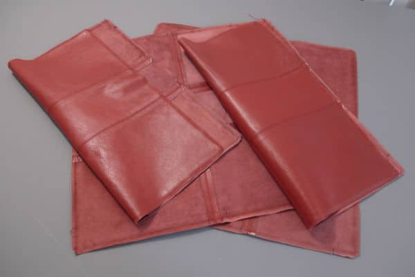 red leather cushion covers which will be upcycled into a tote bag.