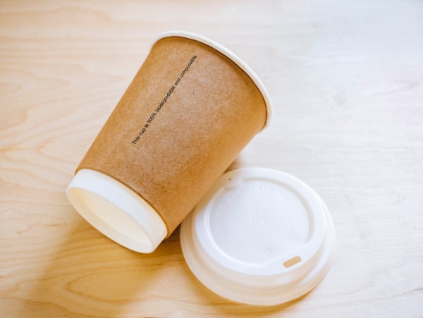 Compostable coffee cup and lid made from PLA