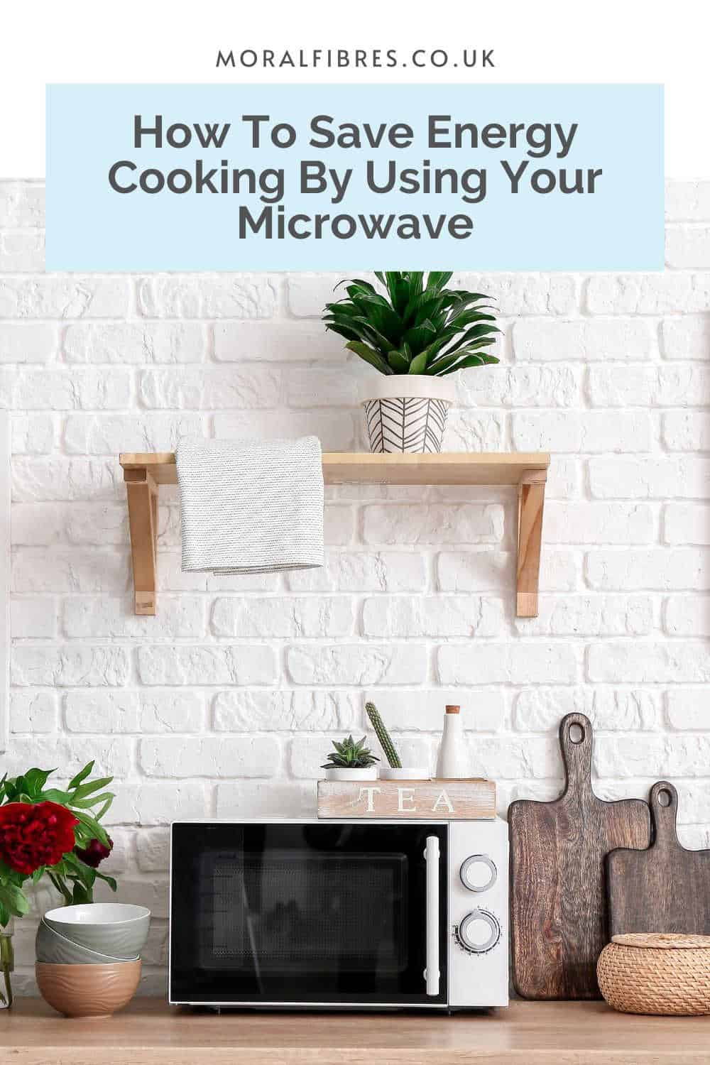 Microwave in a white brick kitchen with a blue text box that reads how to save energy cooking by using your microwave 