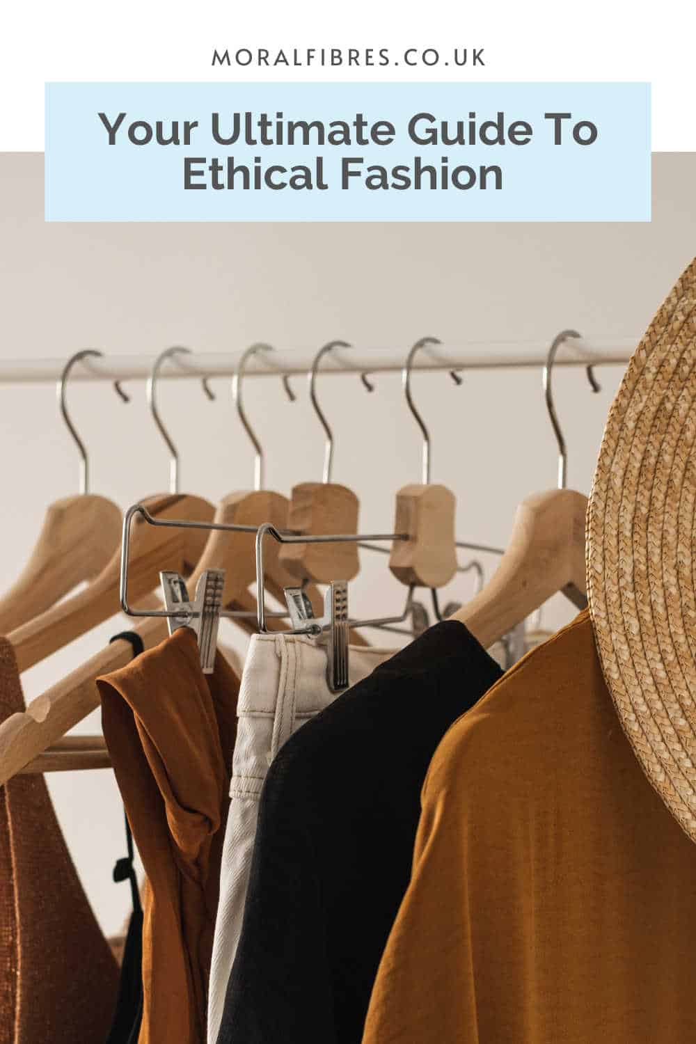 clothes hanging on a rail with a blue text box that reads your ultimate guide to ethical fashion and shopping